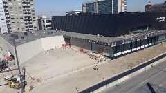 Beautiful aerial shot of Steelhouse Omaha construction progress, with the Capitol District in the background